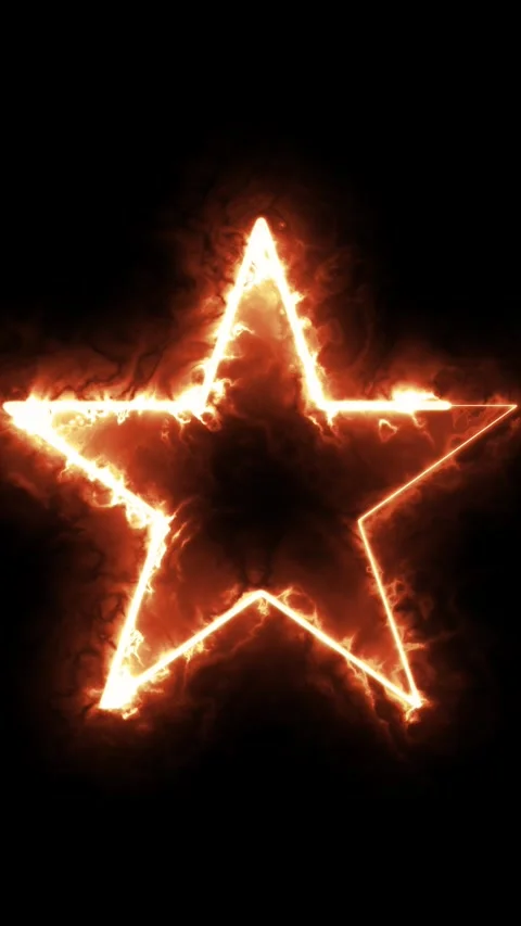 Burning star shape made of vibrant orange glowing flames on black backdrop. Vidéo 337709905