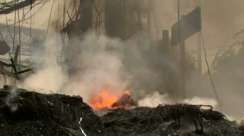 BURNING STREET CIVIL WAR Terrorist Attack Smoking Ruins Bombed City Smoking Ruin Stock Footage