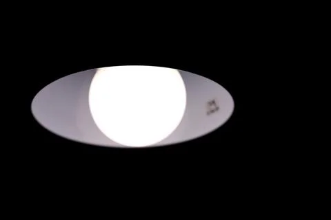 Burning table lamp, abstraction in the form of a human eye Stock Photos