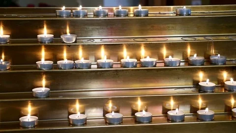 Burning tea candles Stock Footage 75728707