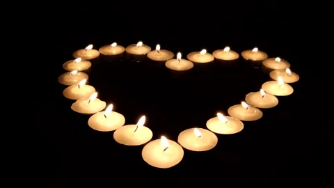 Burning Tea light Candles In The Shape Of A Heart 스톡 동영상 132274802