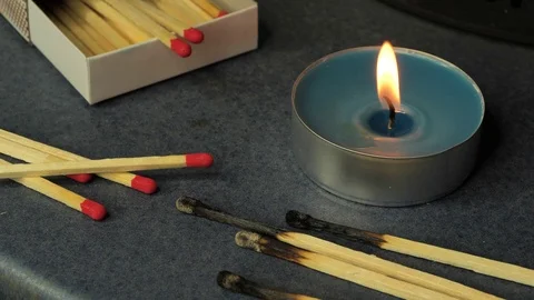 Burning tealight or candle Stock Footage 95443608