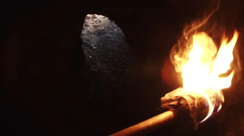Burning Torch in a Cave Stock Footage 46111608