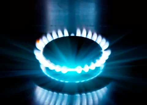 The burning torch on the gas stove Foto stock