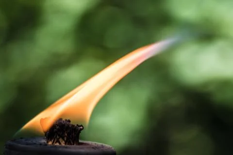 Burning torch wick with flame Stock Photos