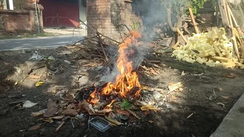 Burning trash in the afternoon Stock Footage 206903726