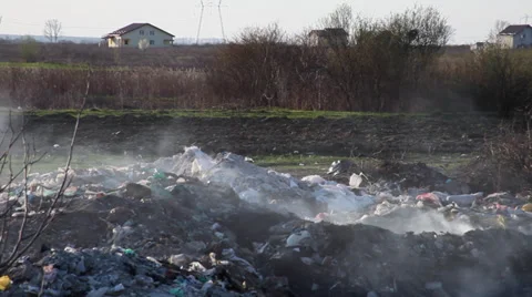 Burning trash, pollution, garbage dump, smoke, construction &amp; demolition waste 動画素材 36779349