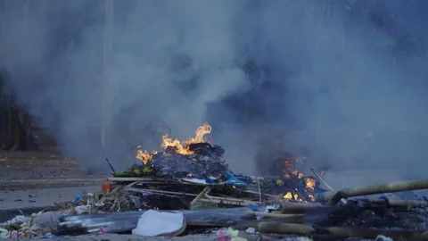 Burning Trash on the Streets in Bali Stock Footage 119904244