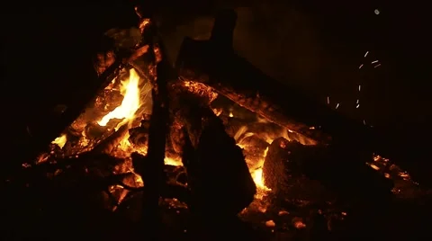 Burning trees in the camp bonfire in the dark. Close up shot. Vietnam. Stock Footage 56067567