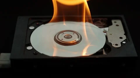 Burning two hard disk drives on dark ground Video stock 93348709