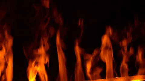 Burning wall of fire on a black background. Flames texture on a black background Stock-Footage 113087062