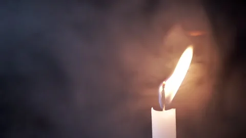 Burning Wax Candle in Cloud of Thick Smoke on Black Background, Close up Stock Footage 312013628