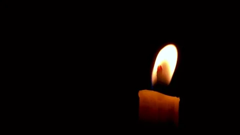 Burning White Candle on the dark, flame of candle on black background Stock Footage 259426166