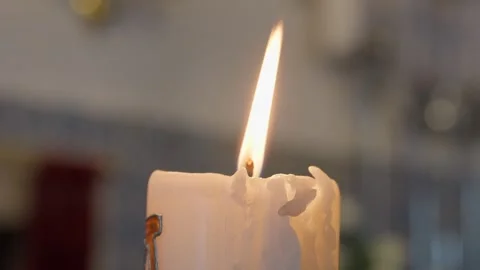 Burning White Candle With Tall Flame And Dripping Wax Close Up Stock Footage 342885596