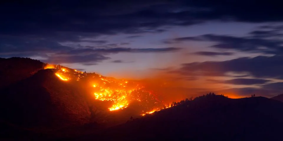 Burning Wildfire at Sunset Stock Photos
