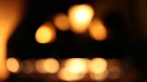 Burning Wood In The Fireplace. Abstract blurred background Video stock 77382978