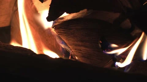 Burning wood in the fireplace close-up,slow motion. Stock Footage 169943318