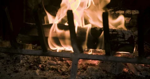 Burning wood In a fireplace Video stock 99730712