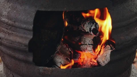 Burning wood inside the boiler Stock Footage 79873457