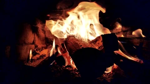 Burning wood inside a fireplace Stock Footage 141010728