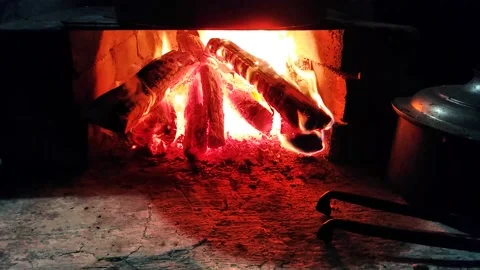 Burning wood inside a fireplace Stock Footage 141010731