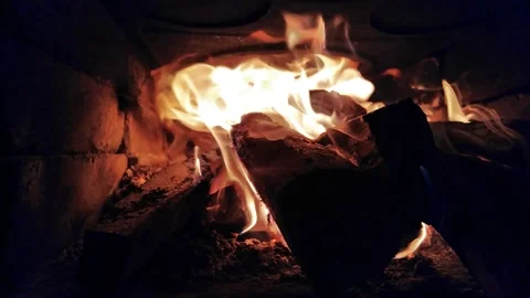 Burning wood inside a fireplace Stock Footage 141010732