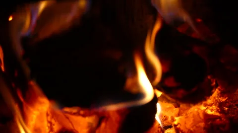 Burning wood in the stove and poker hd Stock Footage