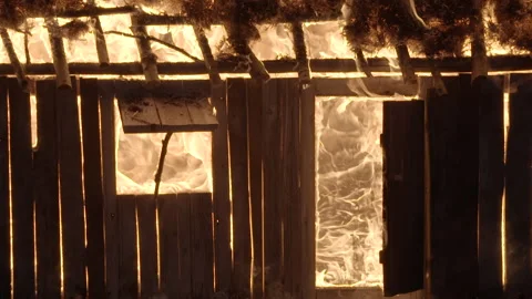 BurningCabin tiltup Stock Footage 165330088
