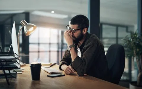 Burnout, computer and web design with man in office for website coding or Stock Photos