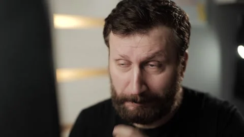 Burnout, vision problems, exhaustion concept. Tired man in glasses working on PC Stock Footage 303948246