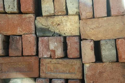 Burnt bricks are arranged. Bricks are used to build constructions Foto stock