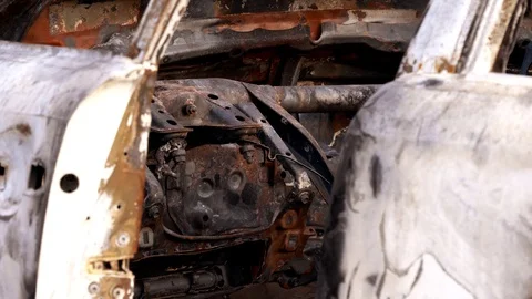 Burnt car. Inside a burnt car. The car after a strong fire. Stock Footage 121748477