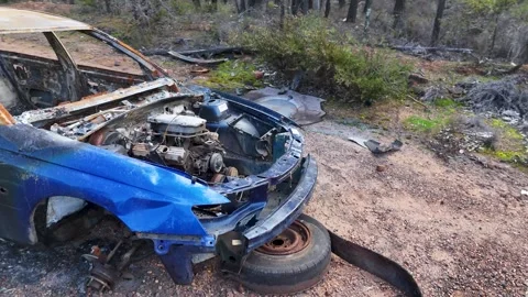 Burnt Car Wreckage with Exposed Engine in Rural Australia Stock Footage 341538038