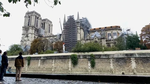 The burnt-down Notre-Dame cathedral in the rain Video stock 118260542