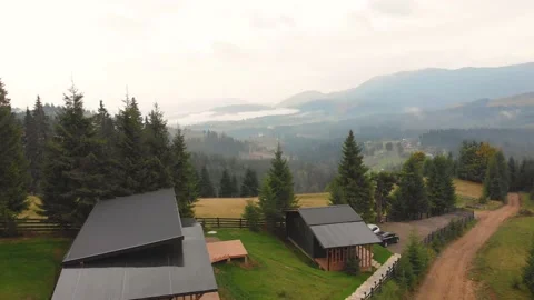 Burnt grass fields at Karpatian mountain village aerial. Nobody nature landscape Stock Footage 197500664