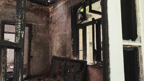 Burnt house after fire Stock Footage 240546819