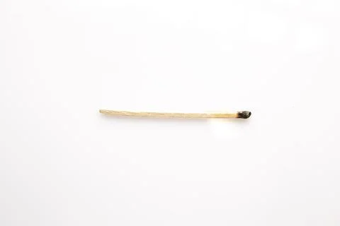 Burnt match on white background Stock Photos