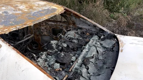 Burnt out car, closeup. Inside a burnt auto. Stock Footage 121748351