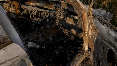 Burnt out car. Inside a burnt auto. The burned-out car interior. Stock Footage 121747853