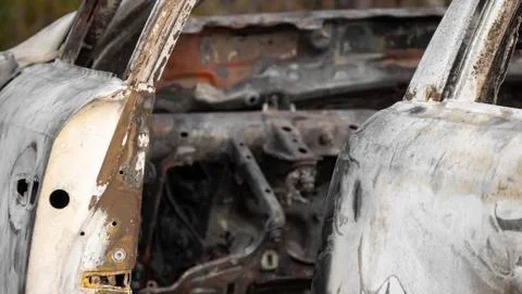 Burnt out car. Inside a burnt auto. The burned-out car interior. Stock Photos