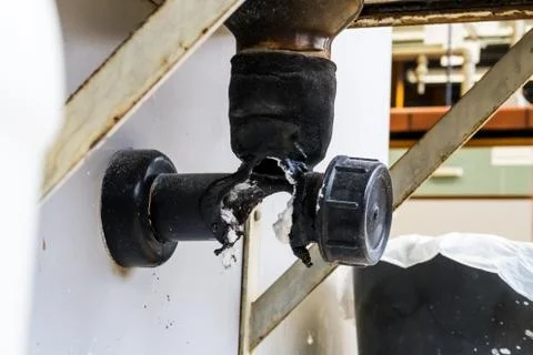 Burnt-out drain pipe Foto stock