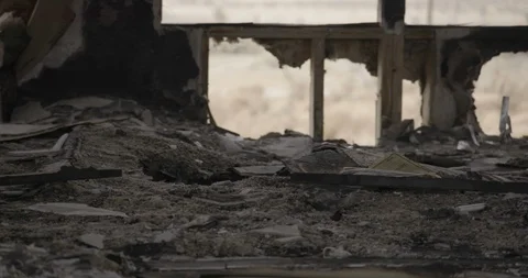Burnt Out Home Floor Medium Close Up Pan Left Stock Footage 89941893