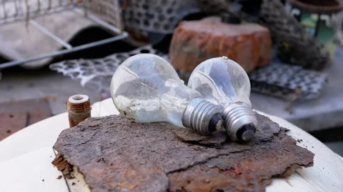 Burnt Out Light Bulb on Slate Stock Footage 293207412
