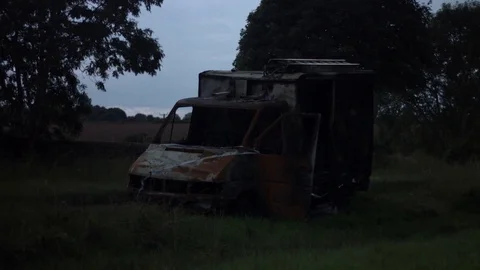 Burnt out van Stock Footage 81439294