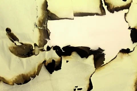 Burnt paper as the background. Stock Photos