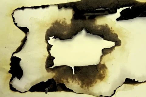 Burnt paper as the background. Stock Photos