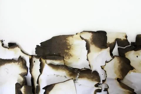 Burnt paper as the background. Stock Photos