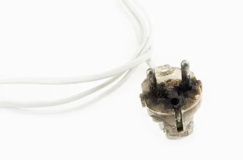 Burnt power plug with white cable Stock Photos