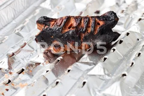 Burnt sausage Stock Photos