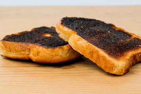 Burnt toast bread slices Stock Photos